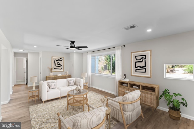 5004 Barnaby Ln, Oxon Hill, MD 20745 - living area featuring light wood-style flooring, visible vents, baseboards, ceiling fan, and recessed lighting