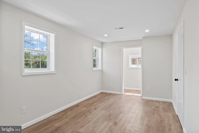 5004 Barnaby Ln, Oxon Hill, MD 20745 - empty room featuring a wealth of natural light, visible vents, and baseboards