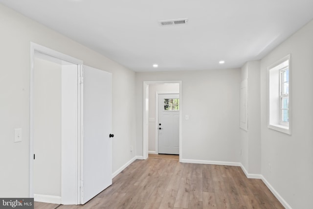 5004 Barnaby Ln, Oxon Hill, MD 20745 - entrance foyer featuring baseboards, light wood finished floors, recessed lighting, and visible vents