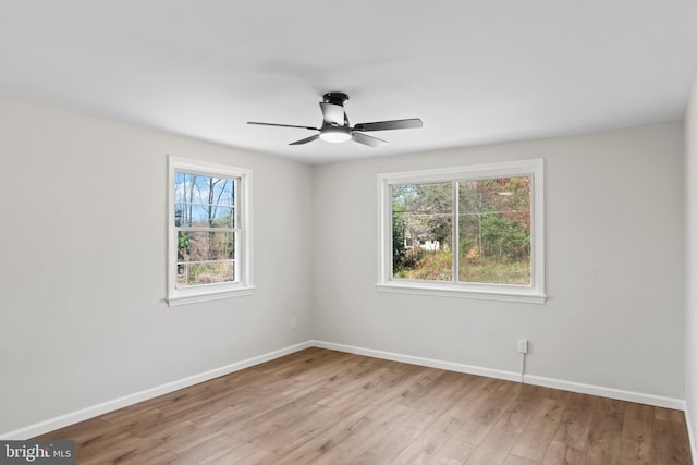 5004 Barnaby Ln, Oxon Hill, MD 20745 - unfurnished room featuring baseboards, a ceiling fan, and wood finished floors