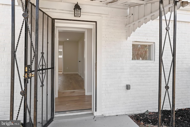 5004 Barnaby Ln, Oxon Hill, MD 20745 - view of exterior entry featuring brick siding