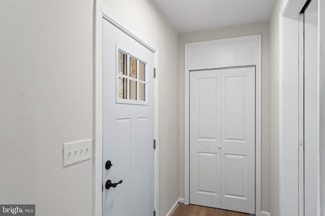 5004 Barnaby Ln, Oxon Hill, MD 20745 - entryway featuring wood finished floors and baseboards