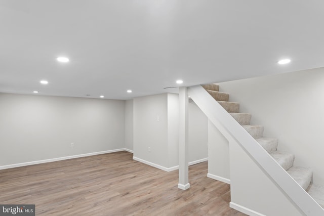 5004 Barnaby Ln, Oxon Hill, MD 20745 - finished basement featuring baseboards, stairs, recessed lighting, and wood finished floors