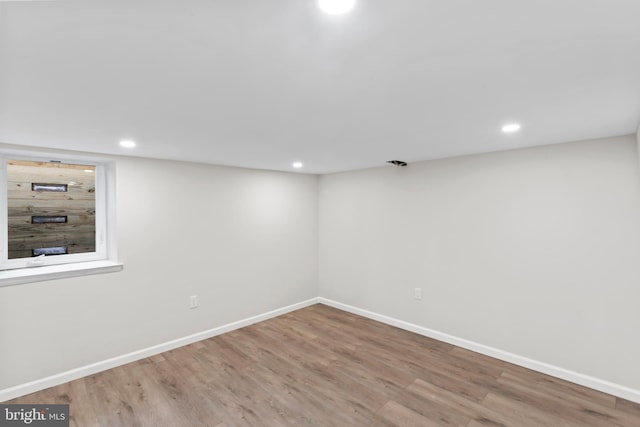 5004 Barnaby Ln, Oxon Hill, MD 20745 - finished basement featuring baseboards, recessed lighting, and wood finished floors