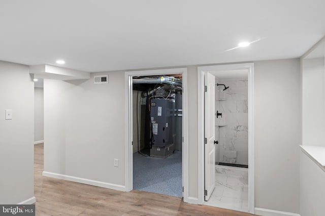 5004 Barnaby Ln, Oxon Hill, MD 20745 - finished basement with recessed lighting, heating unit, baseboards, marble finish floor, and visible vents