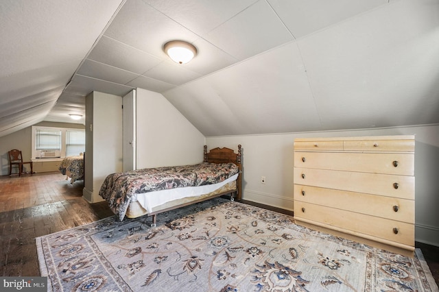 135 Pine St, Dover, DE 19901 - bedroom featuring wood-type flooring, vaulted ceiling, and baseboards