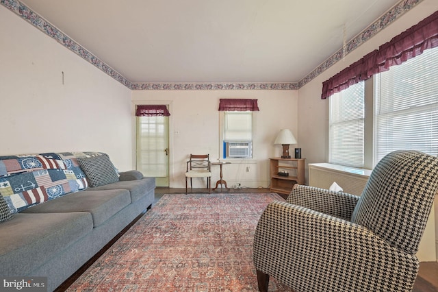 135 Pine St, Dover, DE 19901 - living room featuring healthy amount of natural light and cooling unit