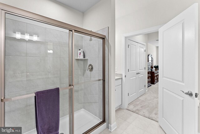 3927 Fair Ridge Dr Unit 305, Fairfax, VA 22033 - full bathroom with a shower stall, tile patterned floors, and baseboards