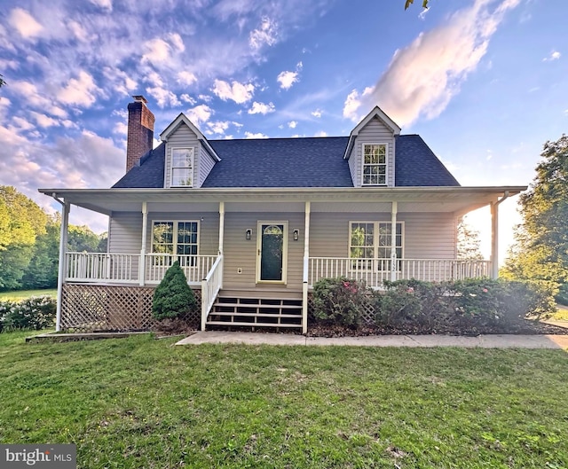 4152 Windy Hills Ln, King George, VA 22485 - view of front of house featuring a chimney, a porch, a front yard, and roof with shingles