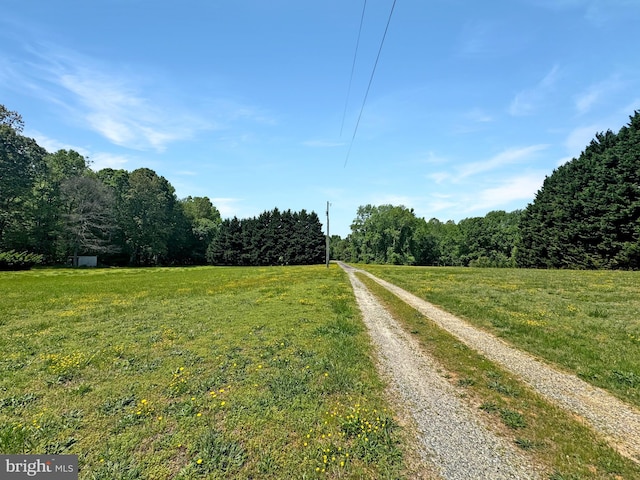 4152 Windy Hills Ln, King George, VA 22485 - view of dirt / gravel road featuring a view of trees and a rural view