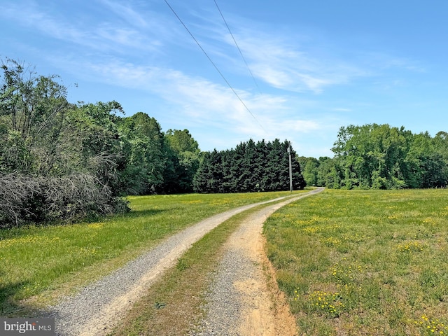 4152 Windy Hills Ln, King George, VA 22485 - view of dirt / gravel road featuring a forest view