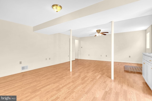 4152 Windy Hills Ln, King George, VA 22485 - basement with ceiling fan, light wood-style floors, and baseboards
