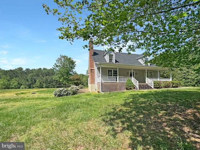 4152 Windy Hills Ln, King George, VA 22485 - view of front of home with covered porch, a front lawn, and a chimney