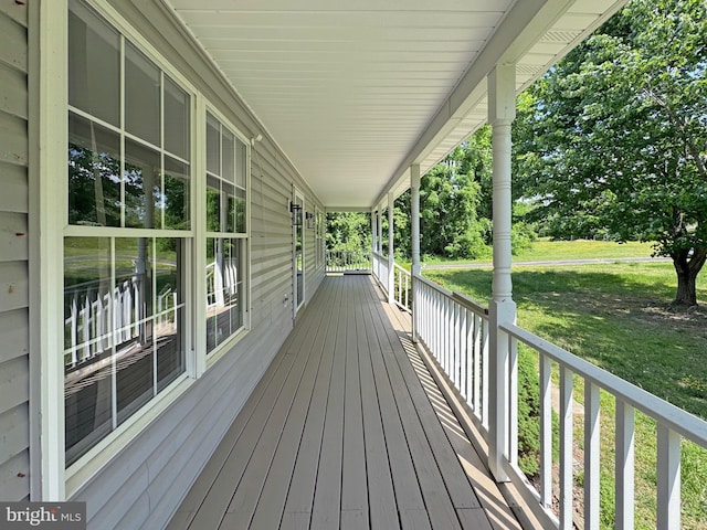 4152 Windy Hills Ln, King George, VA 22485 - wooden porch featuring a yard and view of scattered trees
