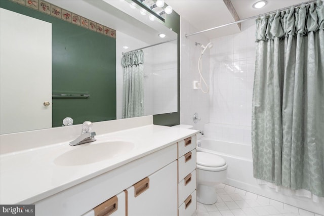 full bath with tile patterned floors, shower / bath combination with curtain, toilet, and vanity