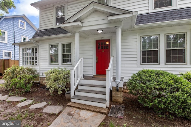 331 E Maple Rd, Linthicum Heights, MD 21090 - property entrance featuring a shingled roof and fence