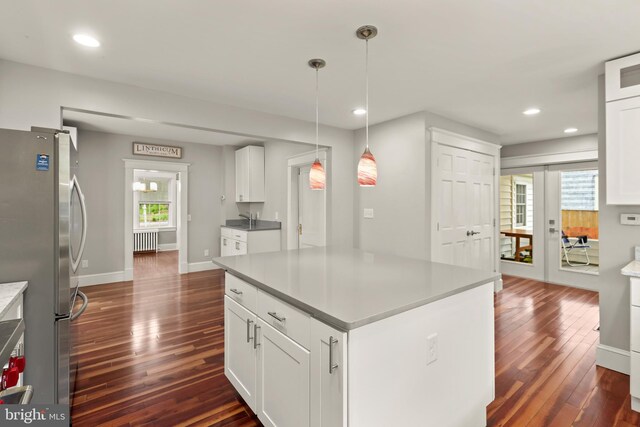331 E Maple Rd, Linthicum Heights, MD 21090 - kitchen featuring freestanding refrigerator, radiator, dark wood-style flooring, recessed lighting, and baseboards