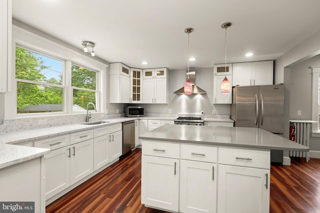 331 E Maple Rd, Linthicum Heights, MD 21090 - kitchen featuring wall chimney exhaust hood, stainless steel appliances, a sink, dark wood finished floors, and recessed lighting