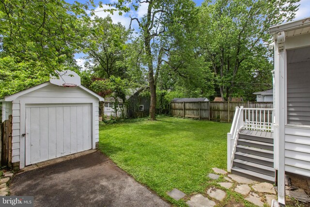 331 E Maple Rd, Linthicum Heights, MD 21090 - view of yard with an outbuilding and a shed