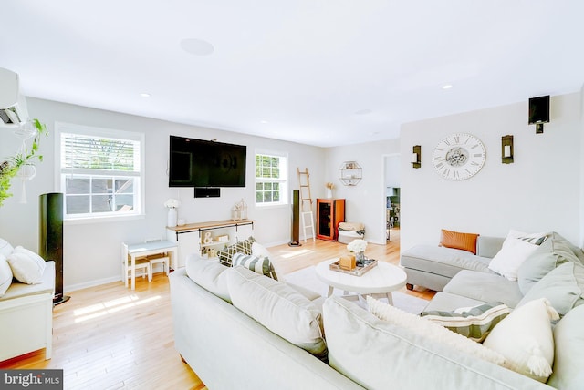 40 Robarts Dr, Phoenixville, PA 19460 - living area featuring light wood finished floors, baseboards, a wall mounted AC, and recessed lighting