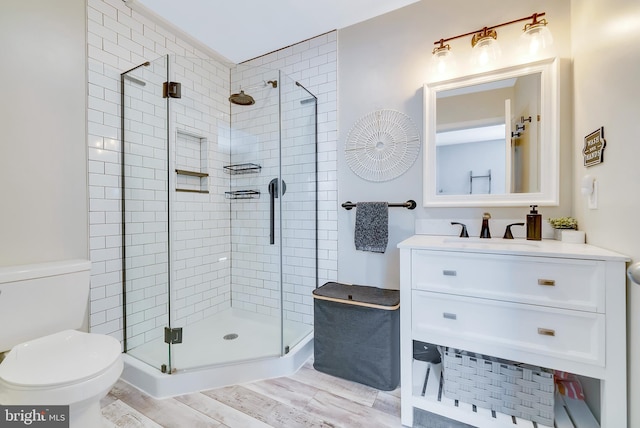 40 Robarts Dr, Phoenixville, PA 19460 - full bath featuring a stall shower, vanity, toilet, and wood finished floors