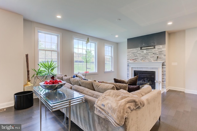 4902 Bridle Ridge Rd, Upper Marlboro, MD 20772 - living area with a tile fireplace, baseboards, and dark wood-style floors
