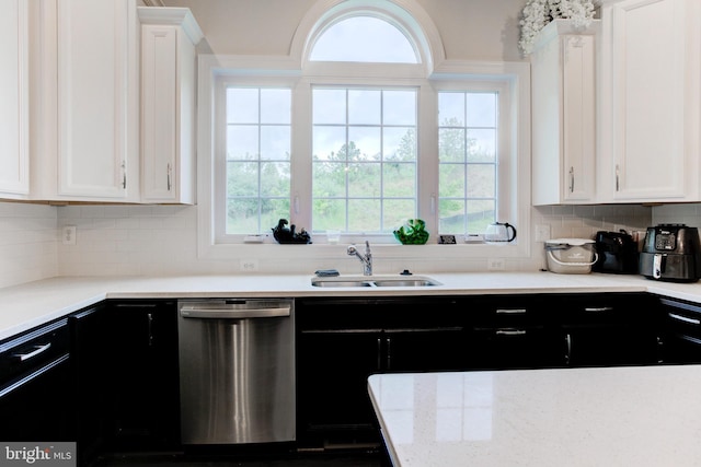 4902 Bridle Ridge Rd, Upper Marlboro, MD 20772 - kitchen featuring white cabinetry, dark cabinets, stainless steel dishwasher, and a sink
