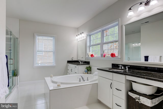 4902 Bridle Ridge Rd, Upper Marlboro, MD 20772 - full bath featuring visible vents, a bath, a sink, a shower stall, and two vanities