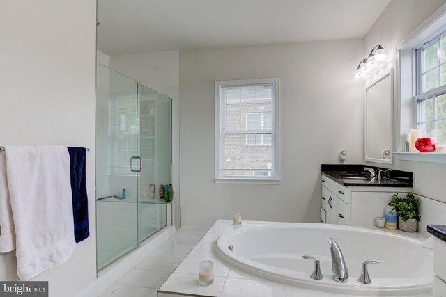 4902 Bridle Ridge Rd, Upper Marlboro, MD 20772 - full bath featuring a stall shower, vanity, a bath, and tile patterned flooring