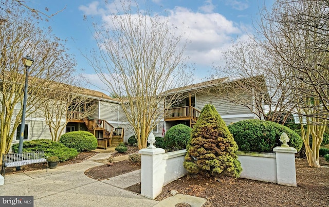 view of front of property with stairway