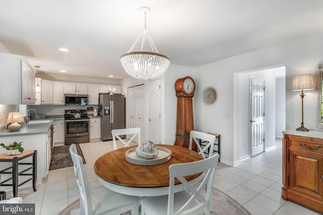 32469 Approach Way Unit 3296, Millsboro, DE 19966 - dining area featuring light tile patterned flooring, a notable chandelier, baseboards, and recessed lighting