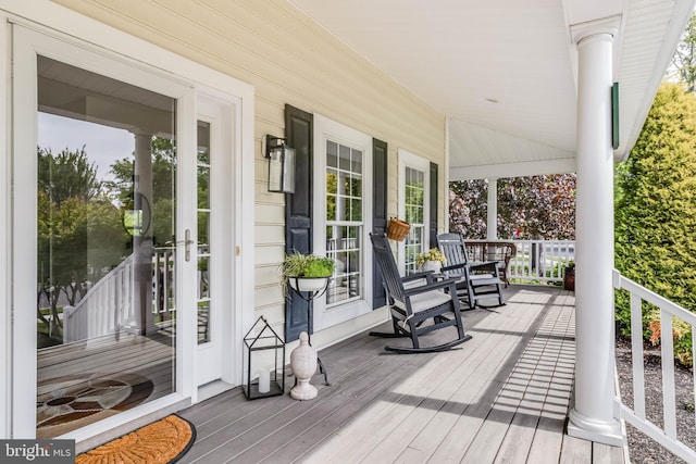 32469 Approach Way Unit 3296, Millsboro, DE 19966 - wooden deck with french doors and covered porch