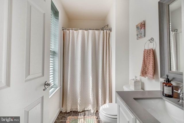 32469 Approach Way Unit 3296, Millsboro, DE 19966 - bathroom featuring curtained shower, vanity, toilet, and tile patterned floors