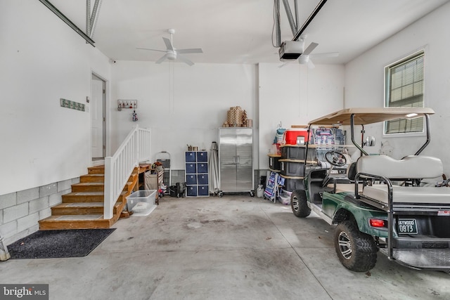 32469 Approach Way Unit 3296, Millsboro, DE 19966 - garage with a garage door opener and ceiling fan