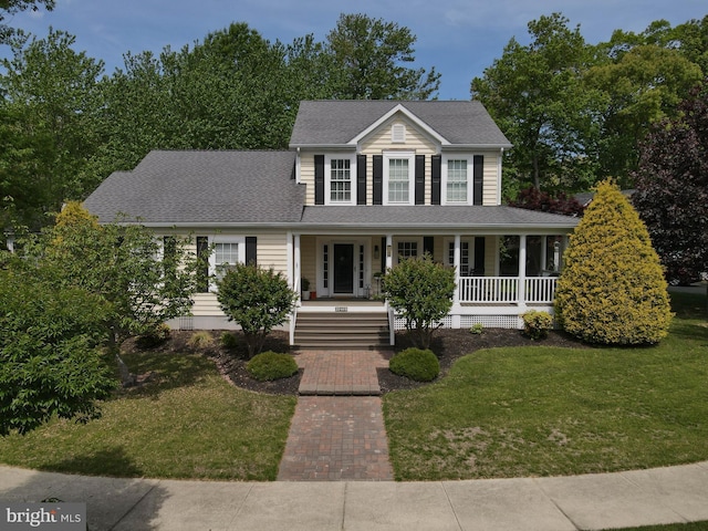32469 Approach Way Unit 3296, Millsboro, DE 19966 - view of front of house with a porch, a shingled roof, and a front lawn