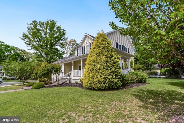 32469 Approach Way Unit 3296, Millsboro, DE 19966 - view of property exterior featuring covered porch and a yard