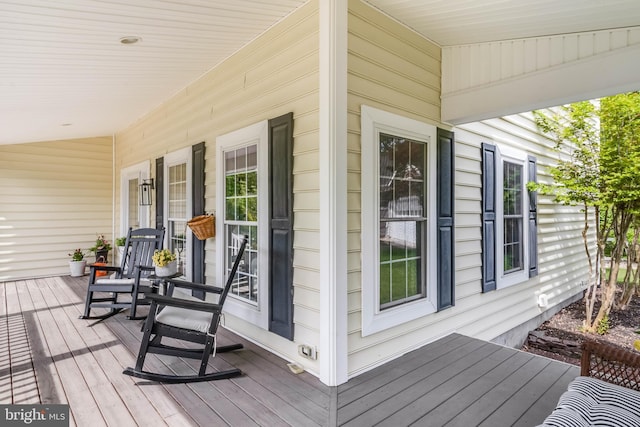 32469 Approach Way Unit 3296, Millsboro, DE 19966 - wooden terrace featuring covered porch