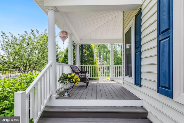 32469 Approach Way Unit 3296, Millsboro, DE 19966 - wooden terrace featuring covered porch