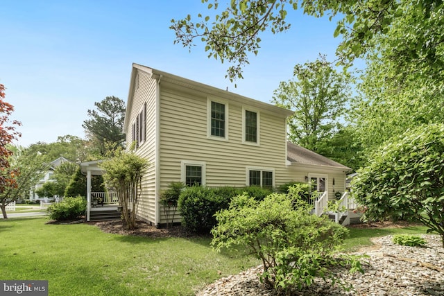 32469 Approach Way Unit 3296, Millsboro, DE 19966 - view of home's exterior featuring a lawn