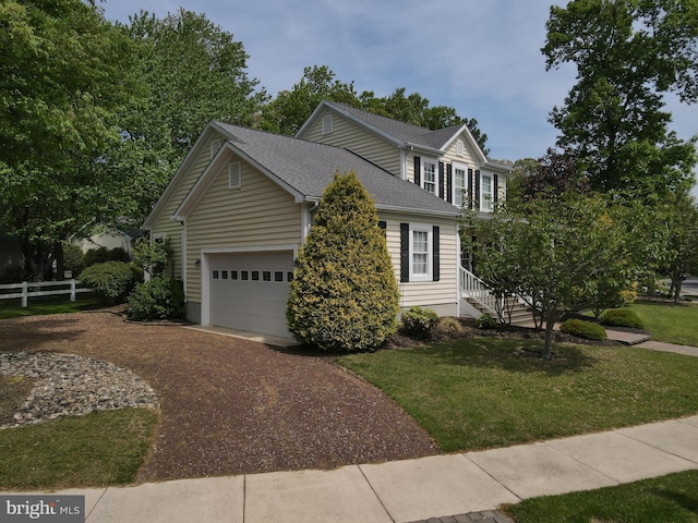 32469 Approach Way Unit 3296, Millsboro, DE 19966 - view of front facade with a shingled roof, driveway, fence, and a front lawn