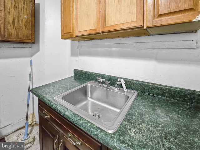 1837 W Juniata St, Philadelphia, PA 19140 - kitchen view of a sink and dark countertops