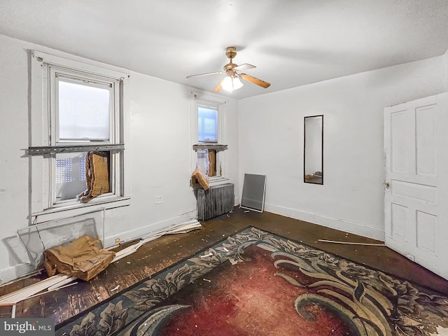 1837 W Juniata St, Philadelphia, PA 19140 - living room with ceiling fan, baseboards, and radiator heating unit