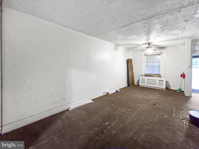 1837 W Juniata St, Philadelphia, PA 19140 - unfurnished room featuring a textured ceiling, a ceiling fan, and baseboards