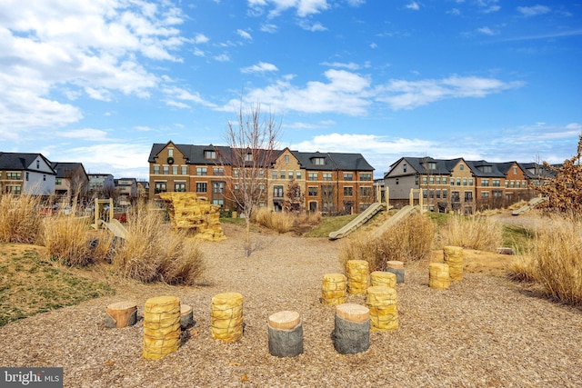 view of playground with a residential view
