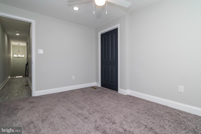 1907 E Lafayette Ave, Baltimore, MD 21213 - unfurnished bedroom featuring recessed lighting, baseboards, ceiling fan with notable chandelier, and carpet floors