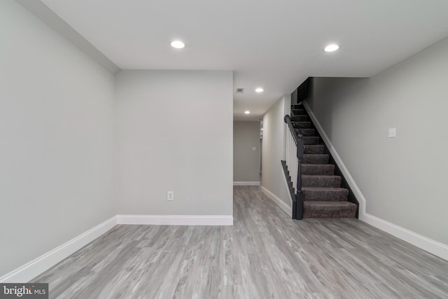 1907 E Lafayette Ave, Baltimore, MD 21213 - interior space with baseboards, stairs, light wood-style floors, and recessed lighting