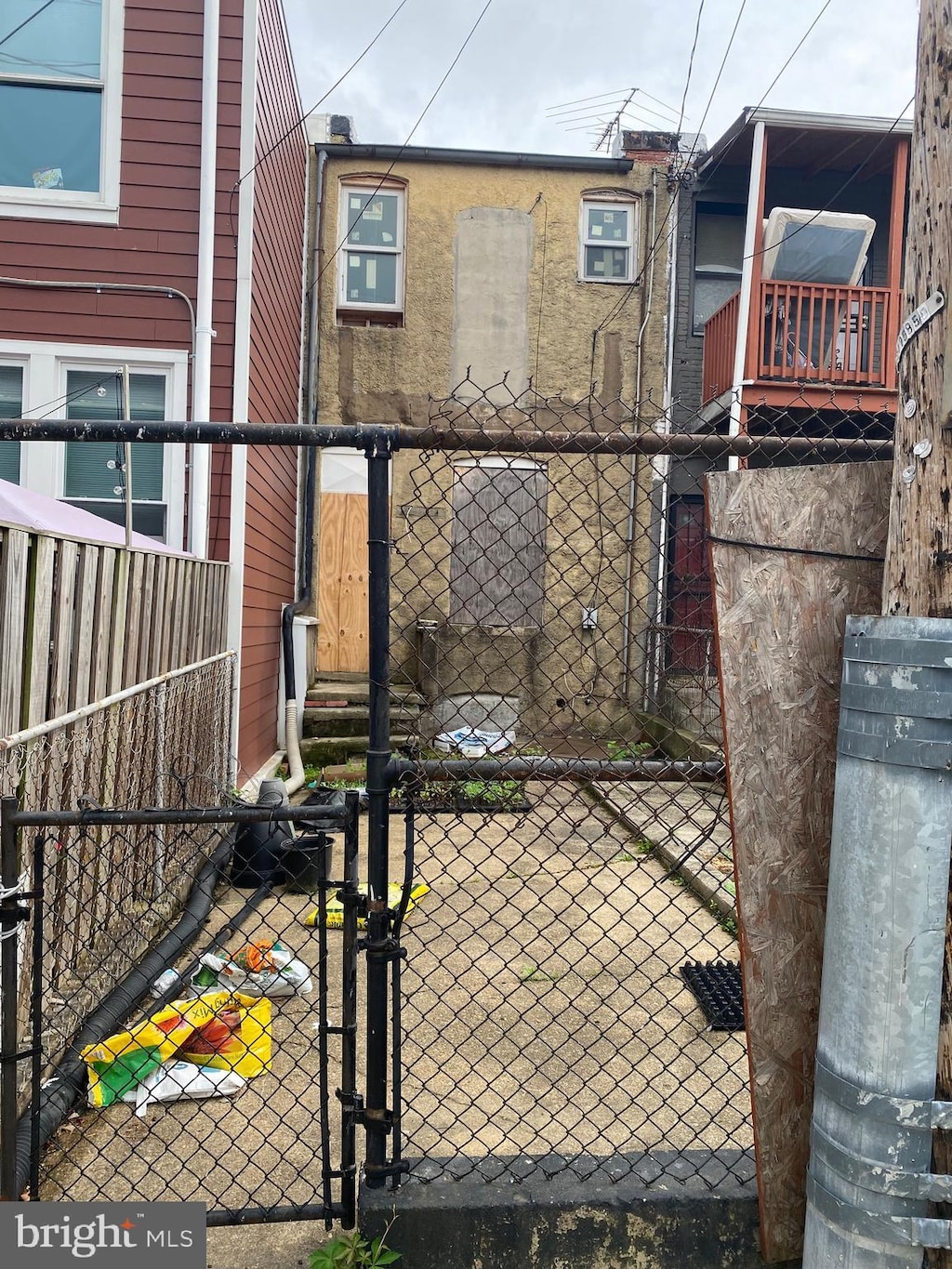 view of gate featuring fence