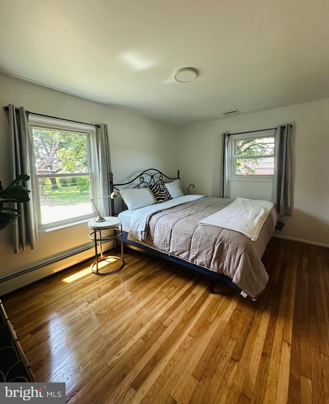 481 Laudermilch Rd, Hershey, PA 17033 - bedroom featuring wood-type flooring and baseboard heating