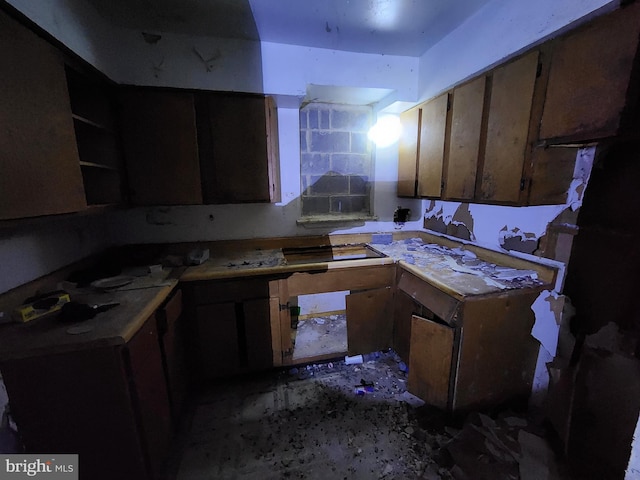 kitchen with open shelves and light countertops