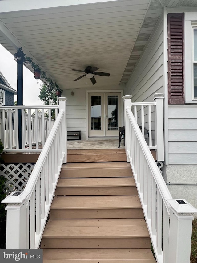 exterior space featuring a ceiling fan and french doors